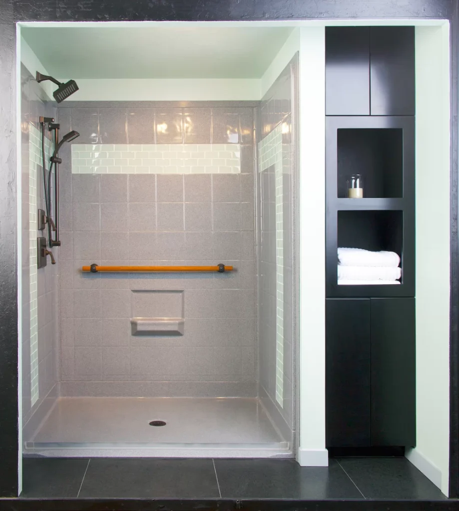 An example walk-in shower with a cabinet on the outside.