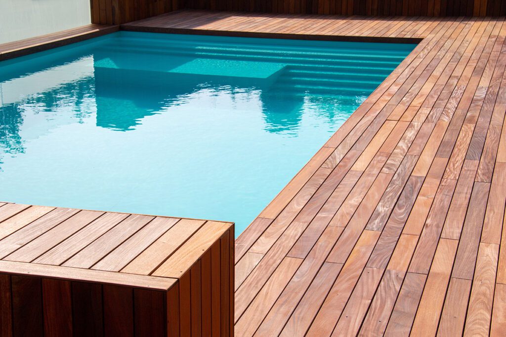 Hardwood IPE pool deck on a sunny day.